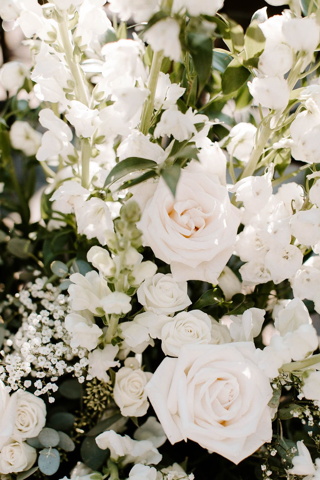 White and green floral arrangements for wedding reception 