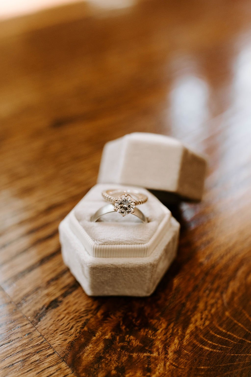  Beautiful silver diamond wedding ring in a lgiht grey ring box 