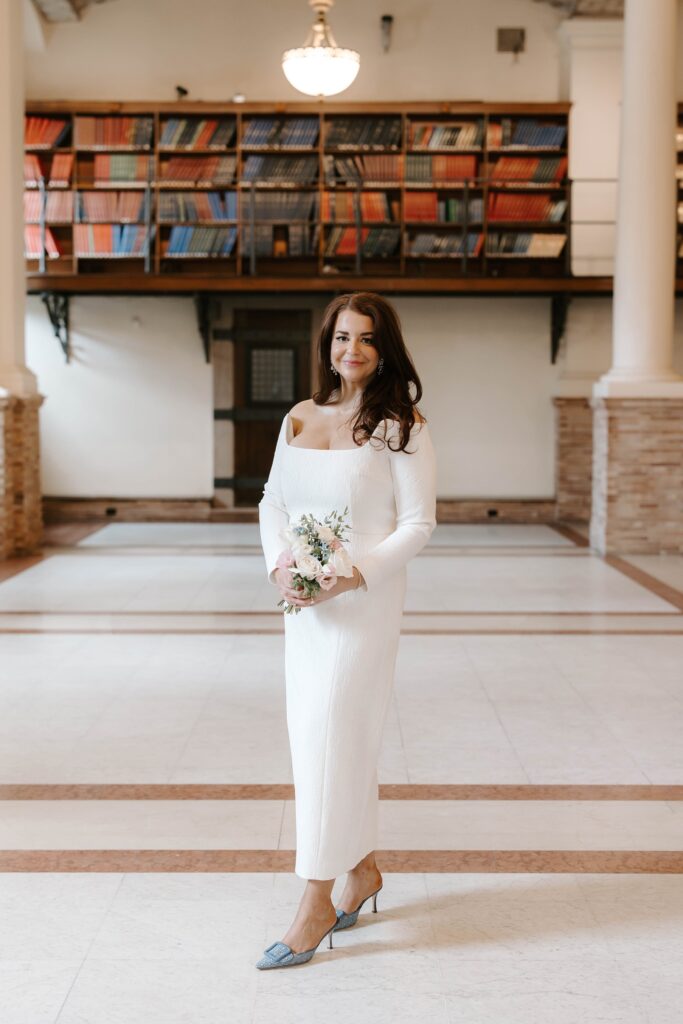 Bride poses at her Boston Public Library elopement
