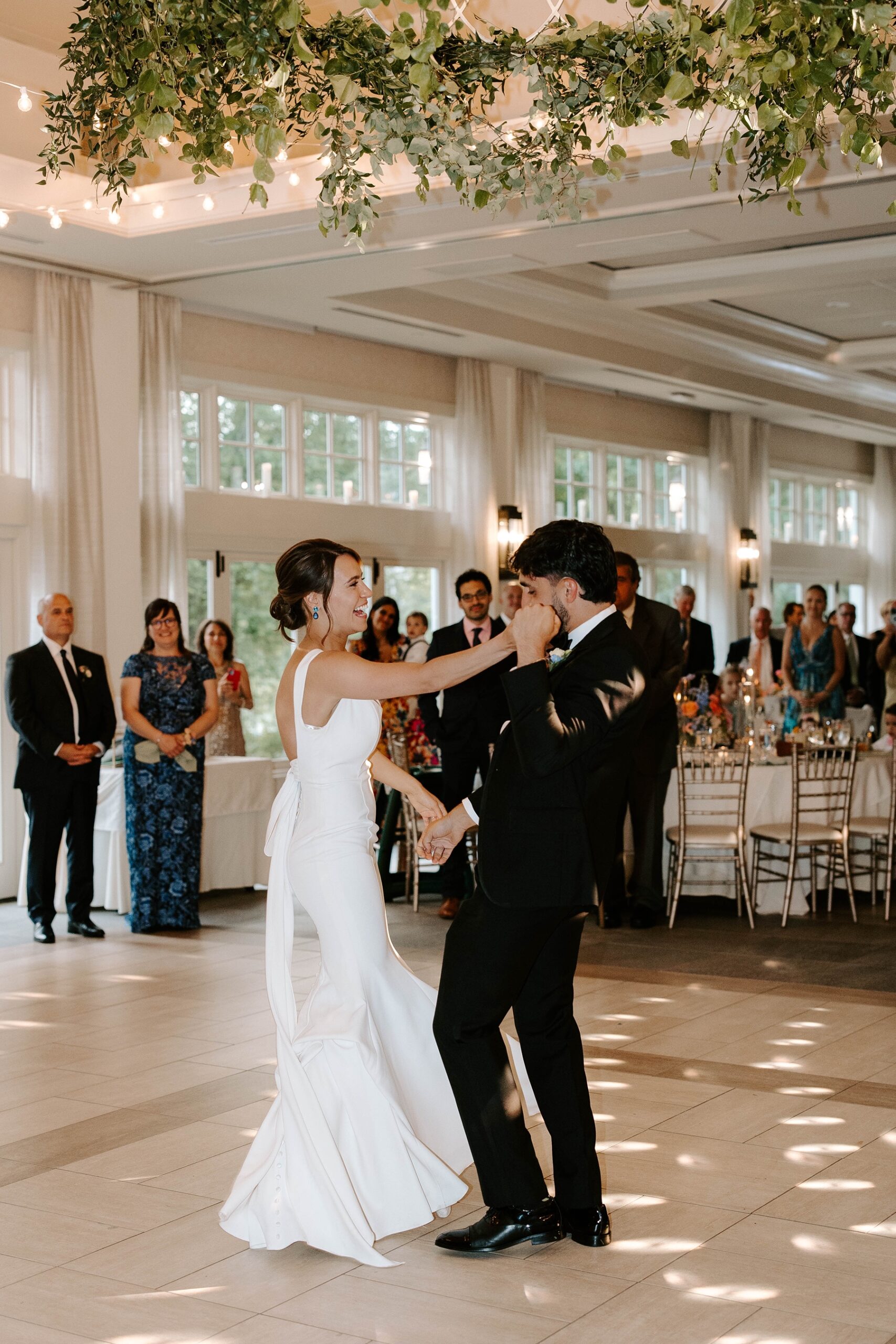 Bride and groom dance at their Indian Trail Club wedding reception