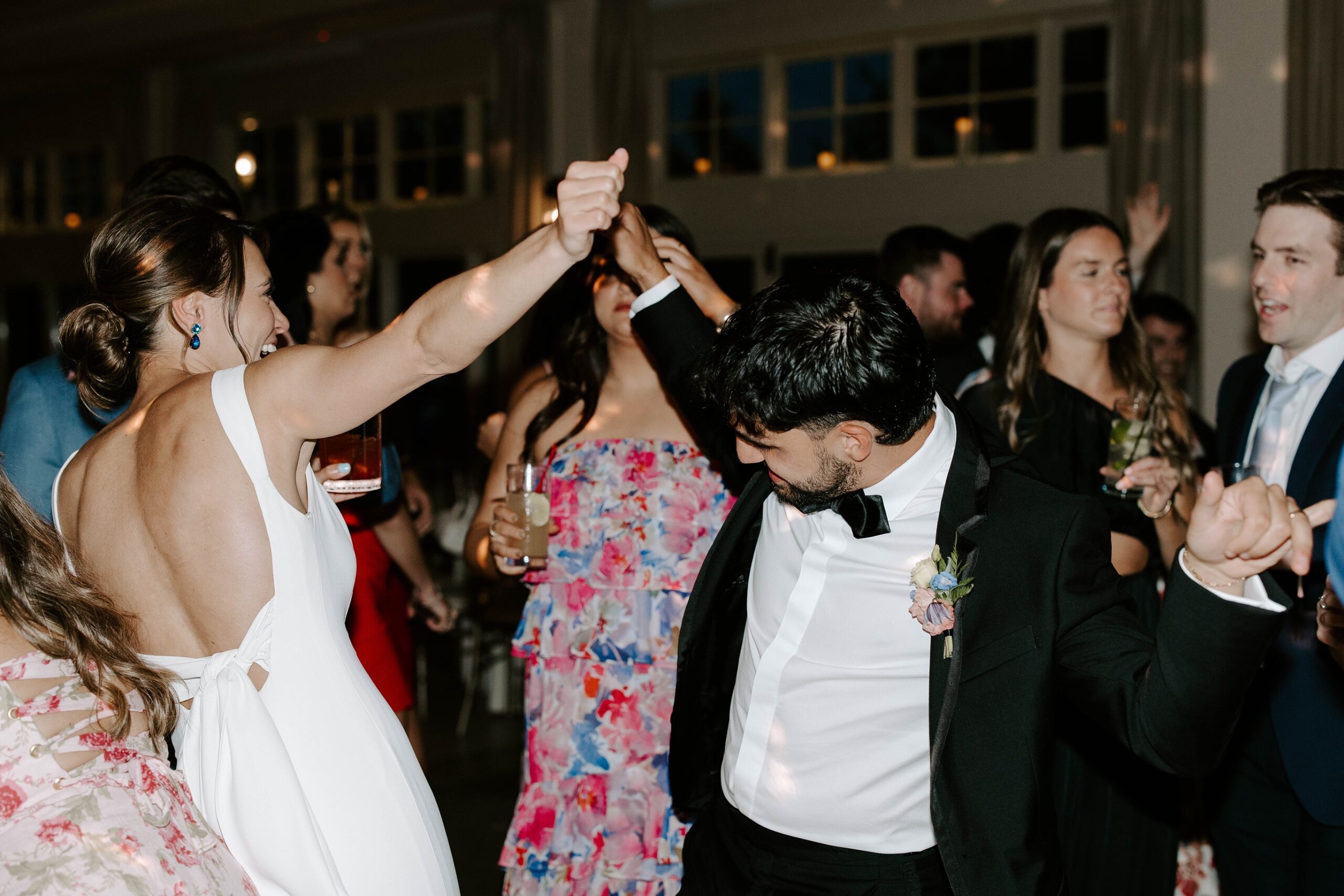 Bride and groom dance together at their Indian Trail Club wedding reception