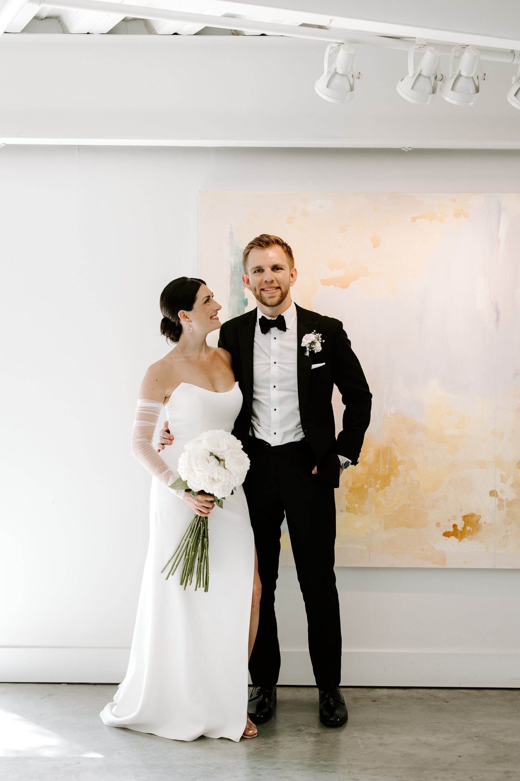 Bride and groom portraits at Artists for Humanity Epicenter
