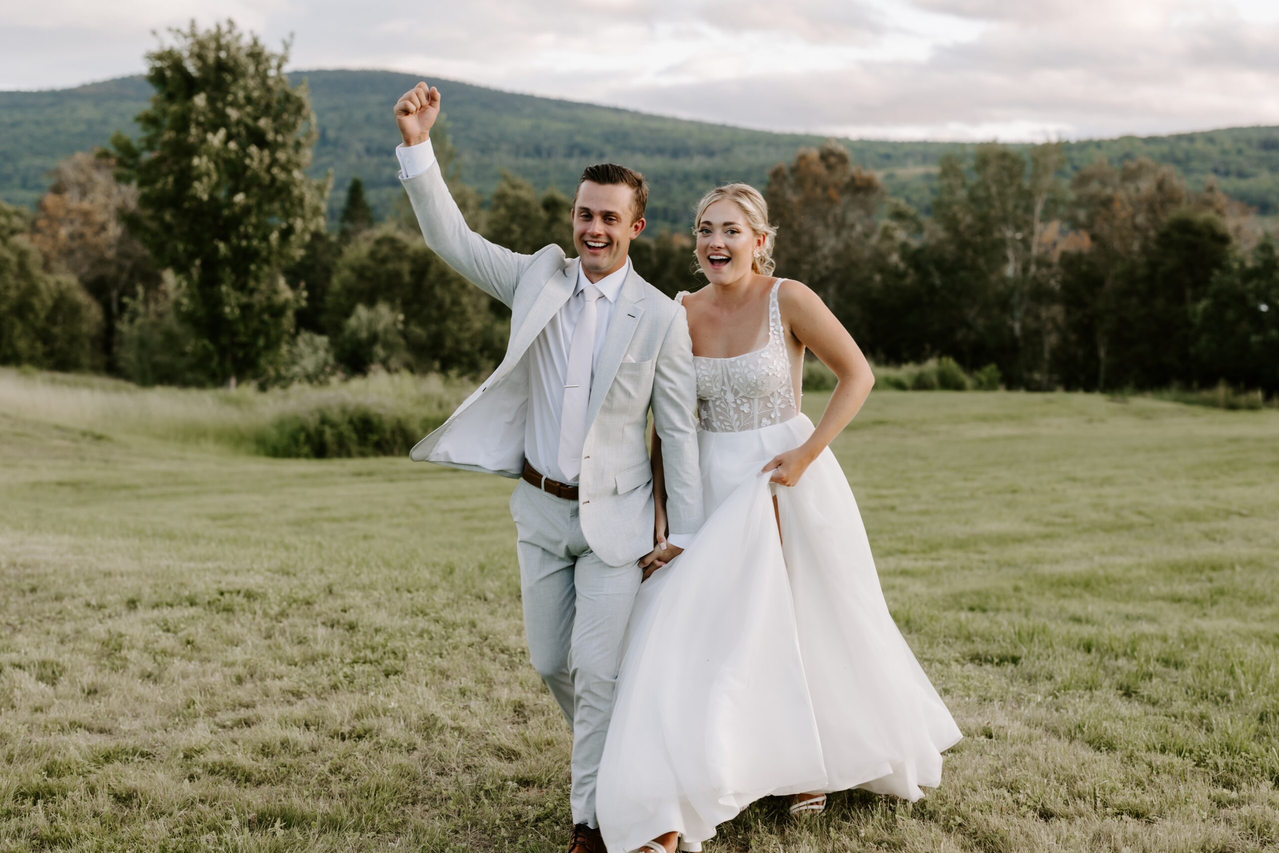 Couple poses for Maine wedding photos at Mountain Star Estate