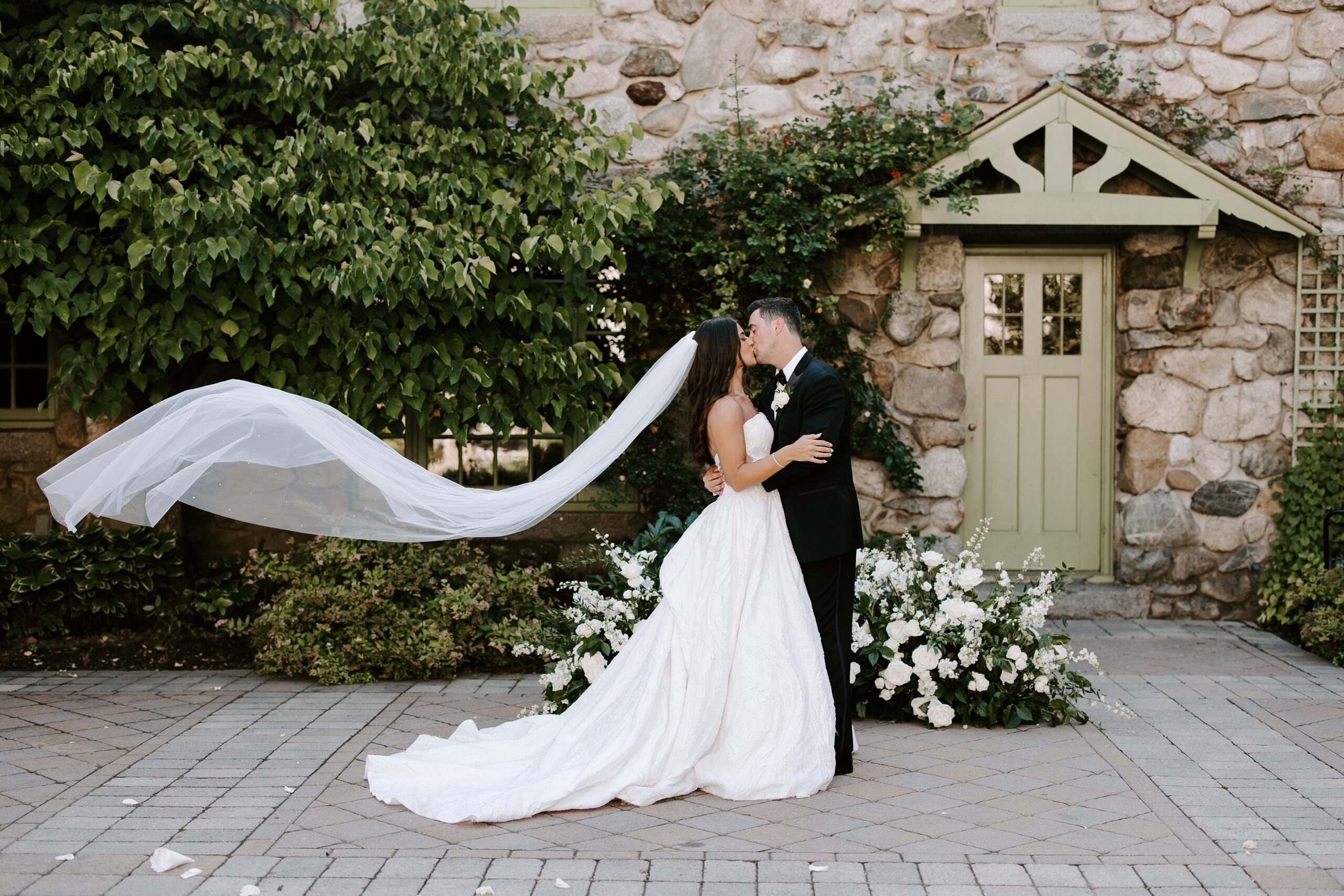 Bride and groom kiss at Willowdale Estate wedding