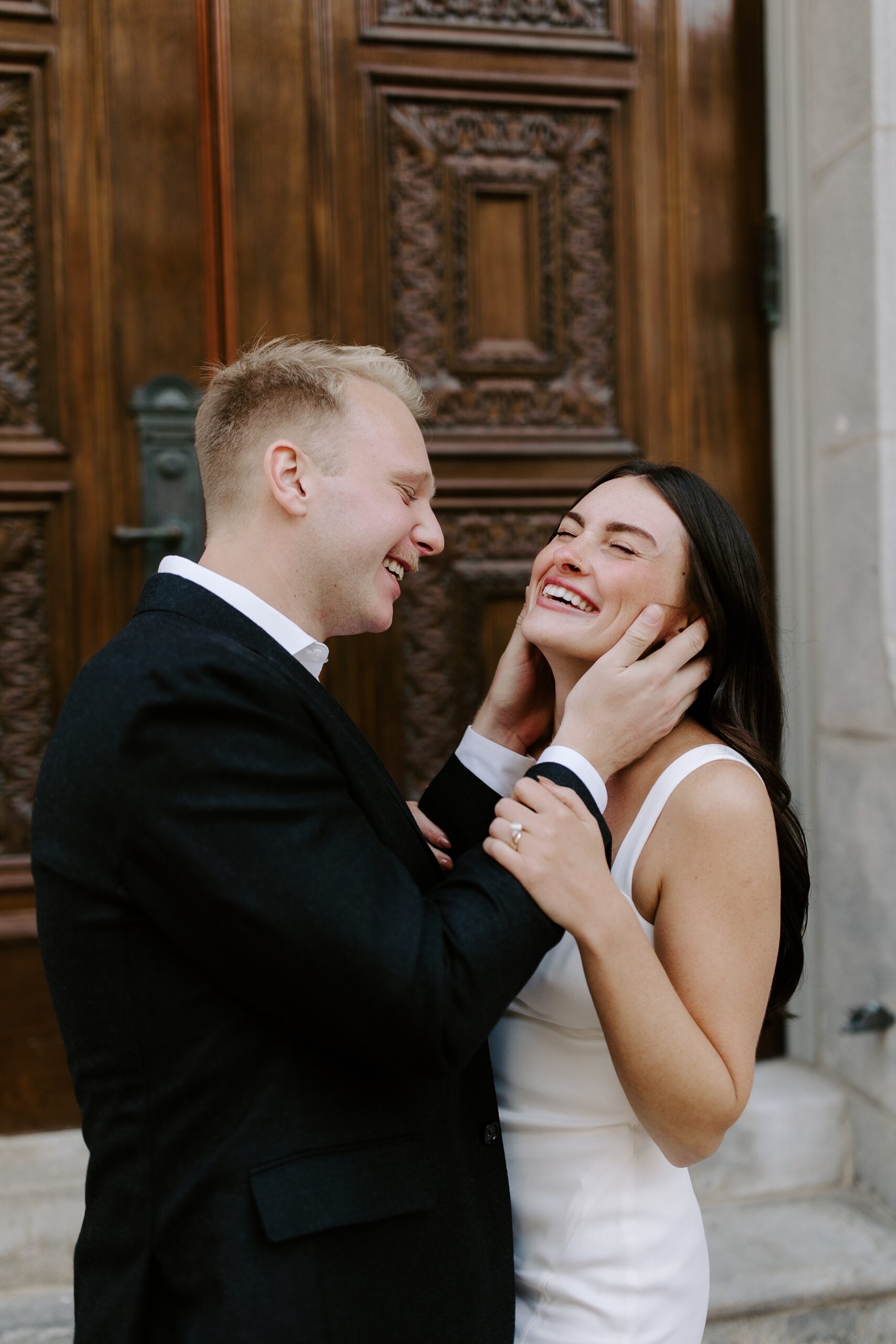 Couple laughs during Boston elopement photos