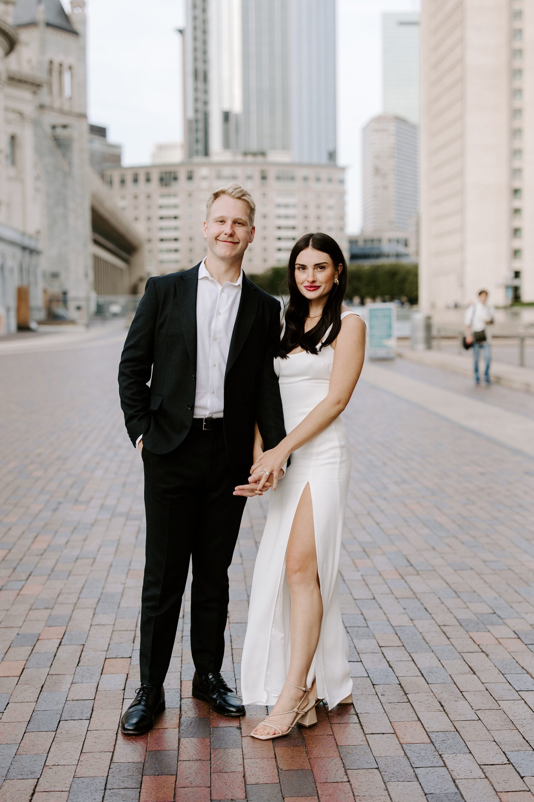 Bride and groom smile at camera during Boston elopement