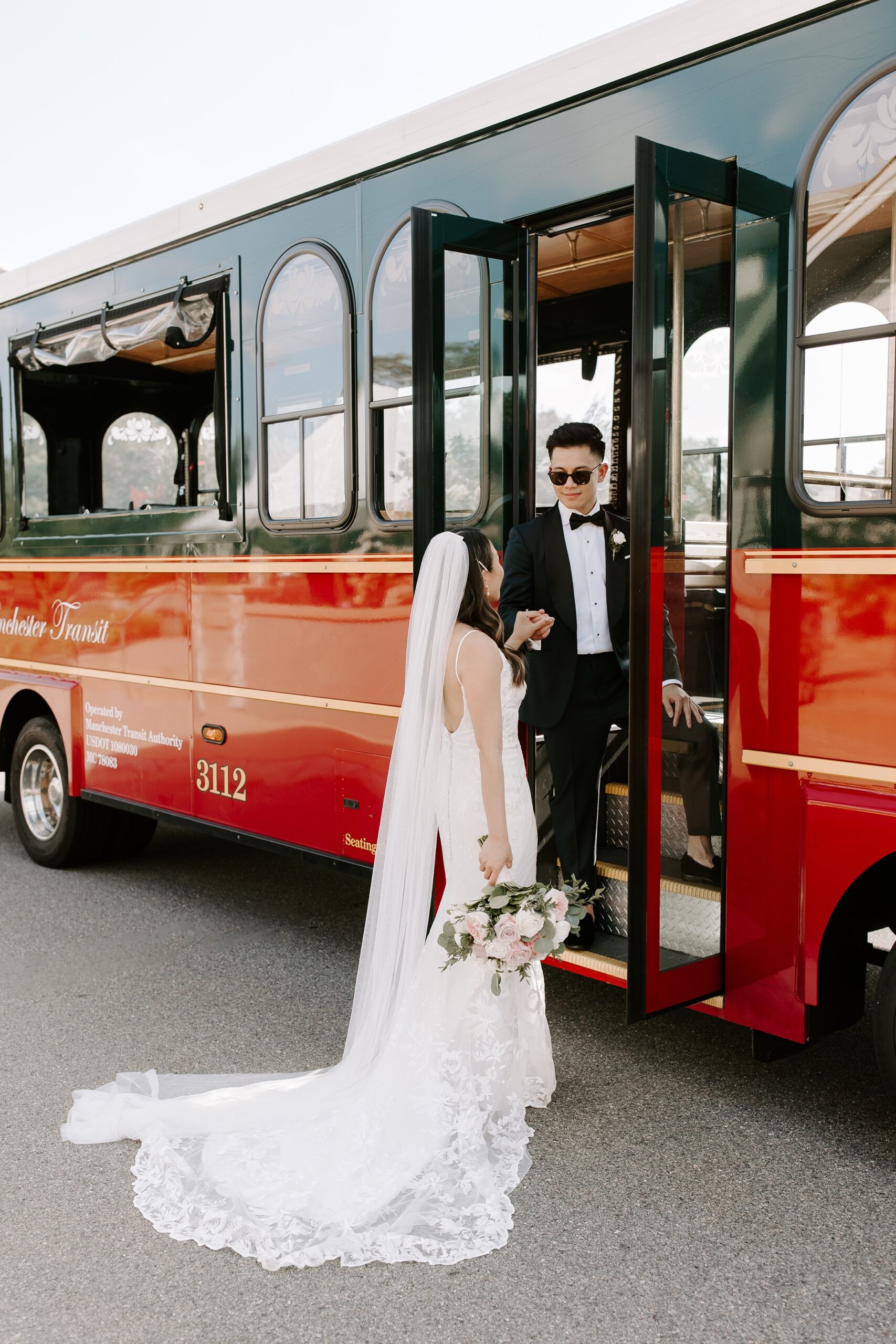 Bride and groom near trolley