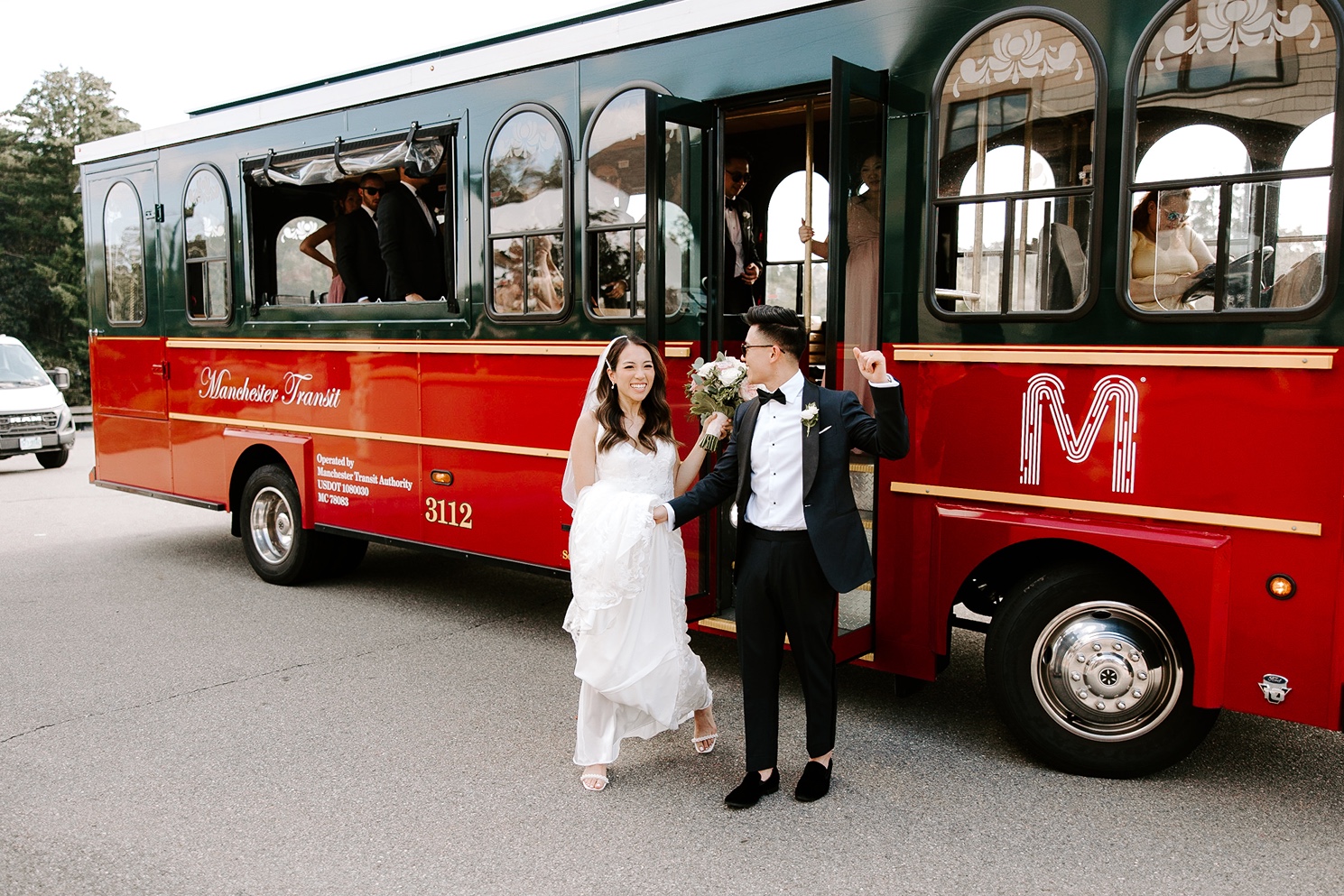 Bride and groom near trolley