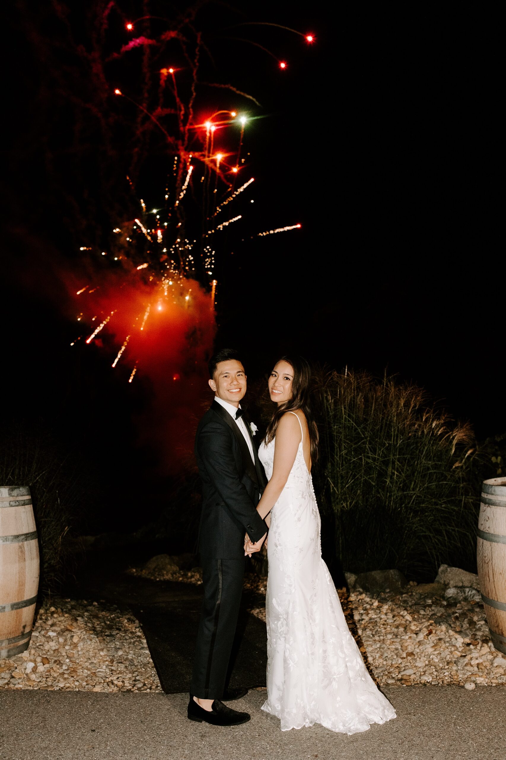 Bride and groom under fireworks at Labelle Winery wedding
