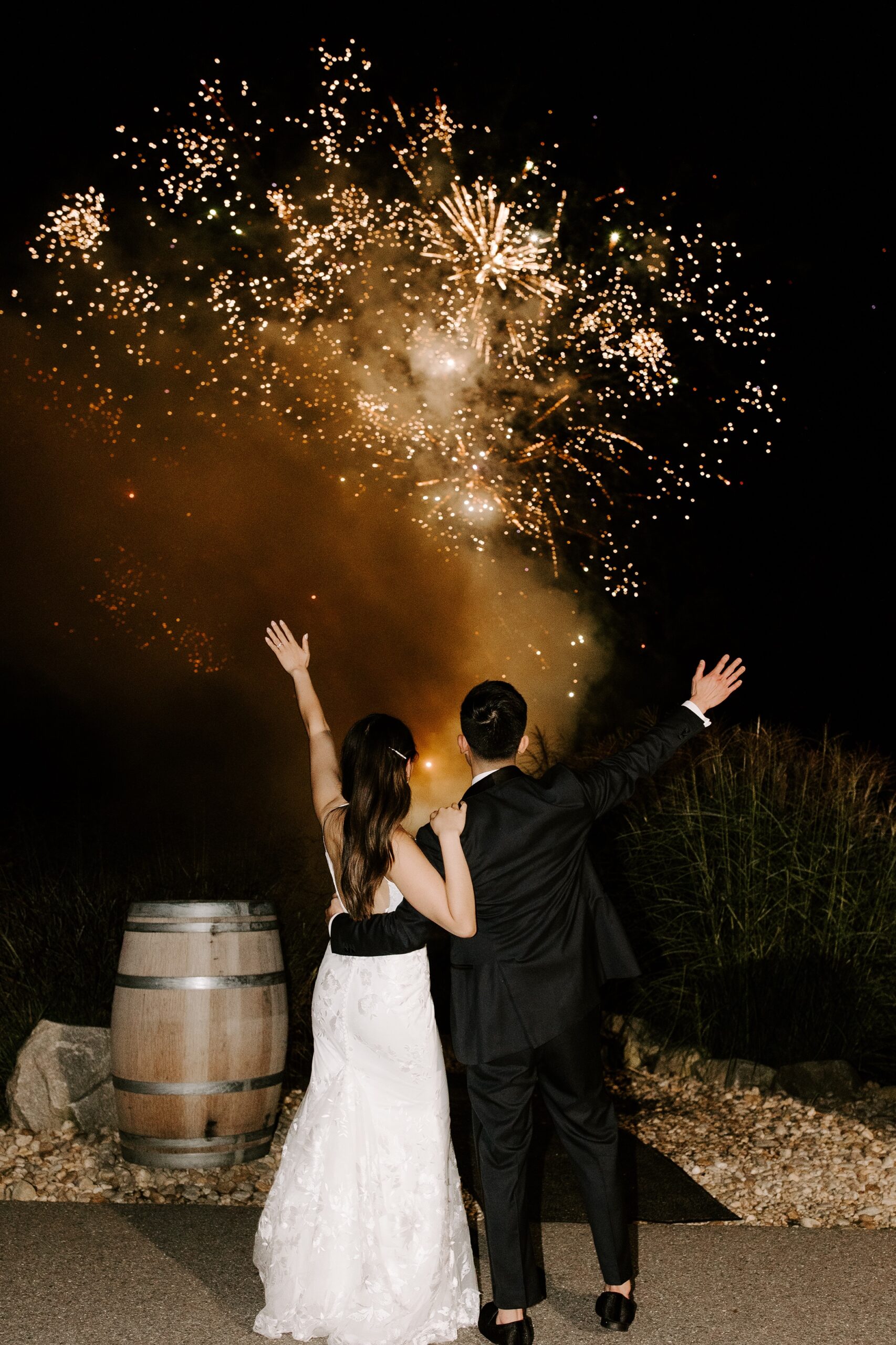 Bride and groom watch fireworks at Labelle Winery wedding
