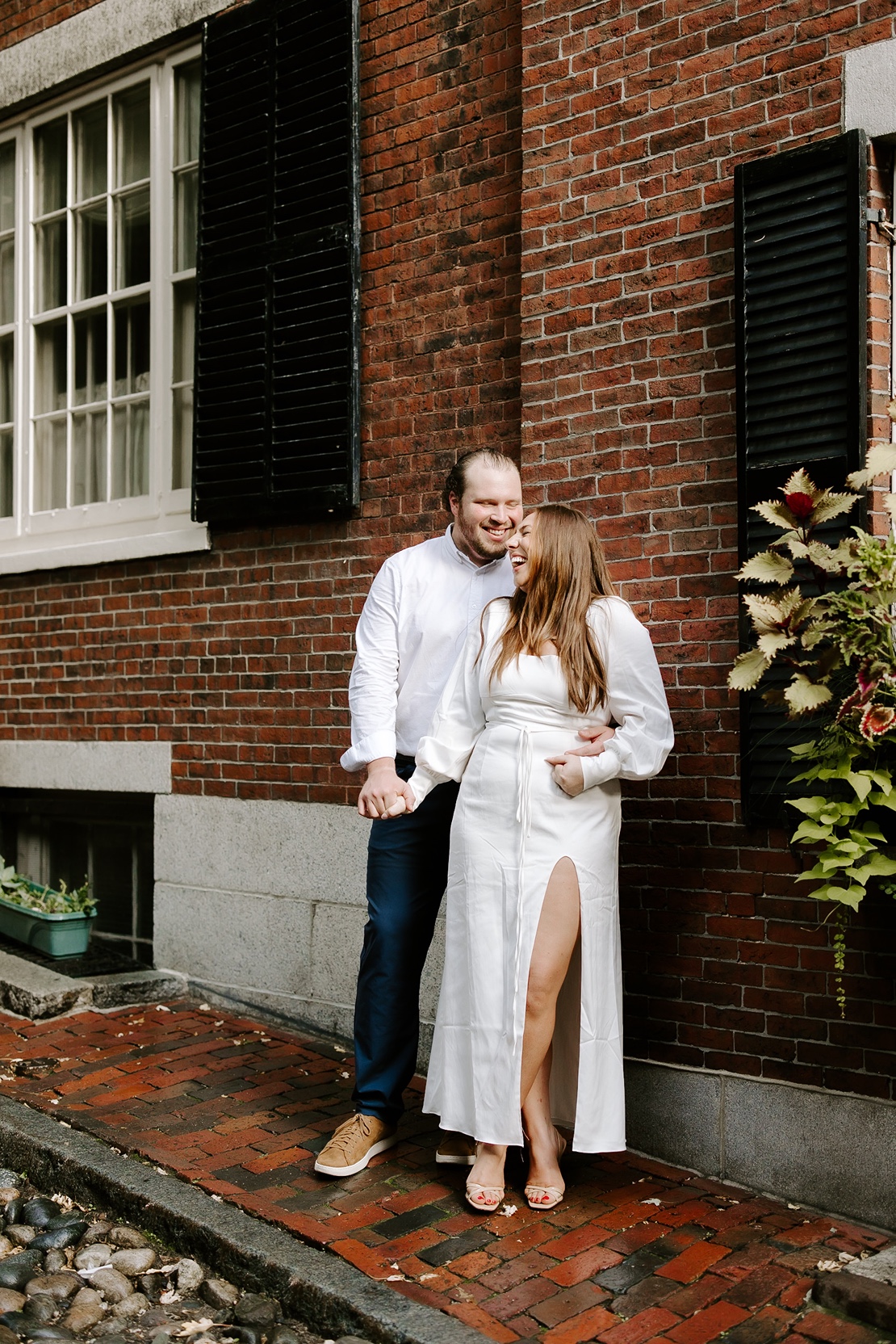 Couple poses during Beacon Hill engagement session