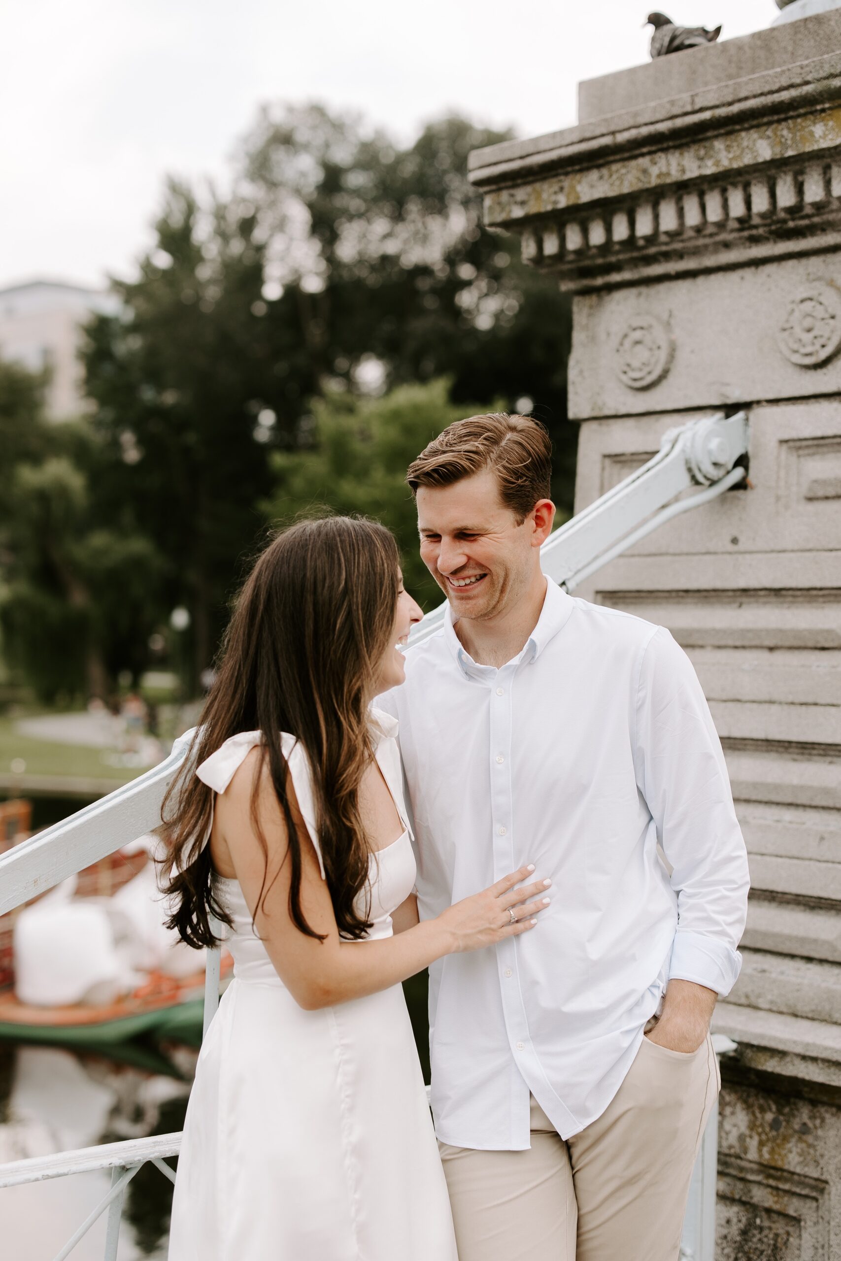 Couple laughs during Boston Common engagement session