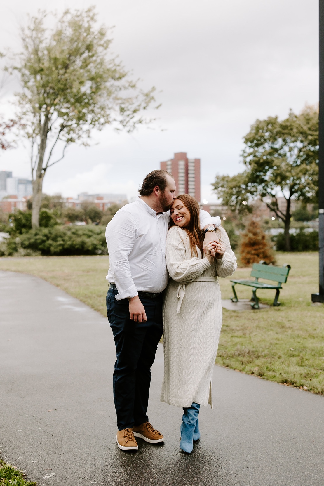 Couple hugs during Boston engagement photos