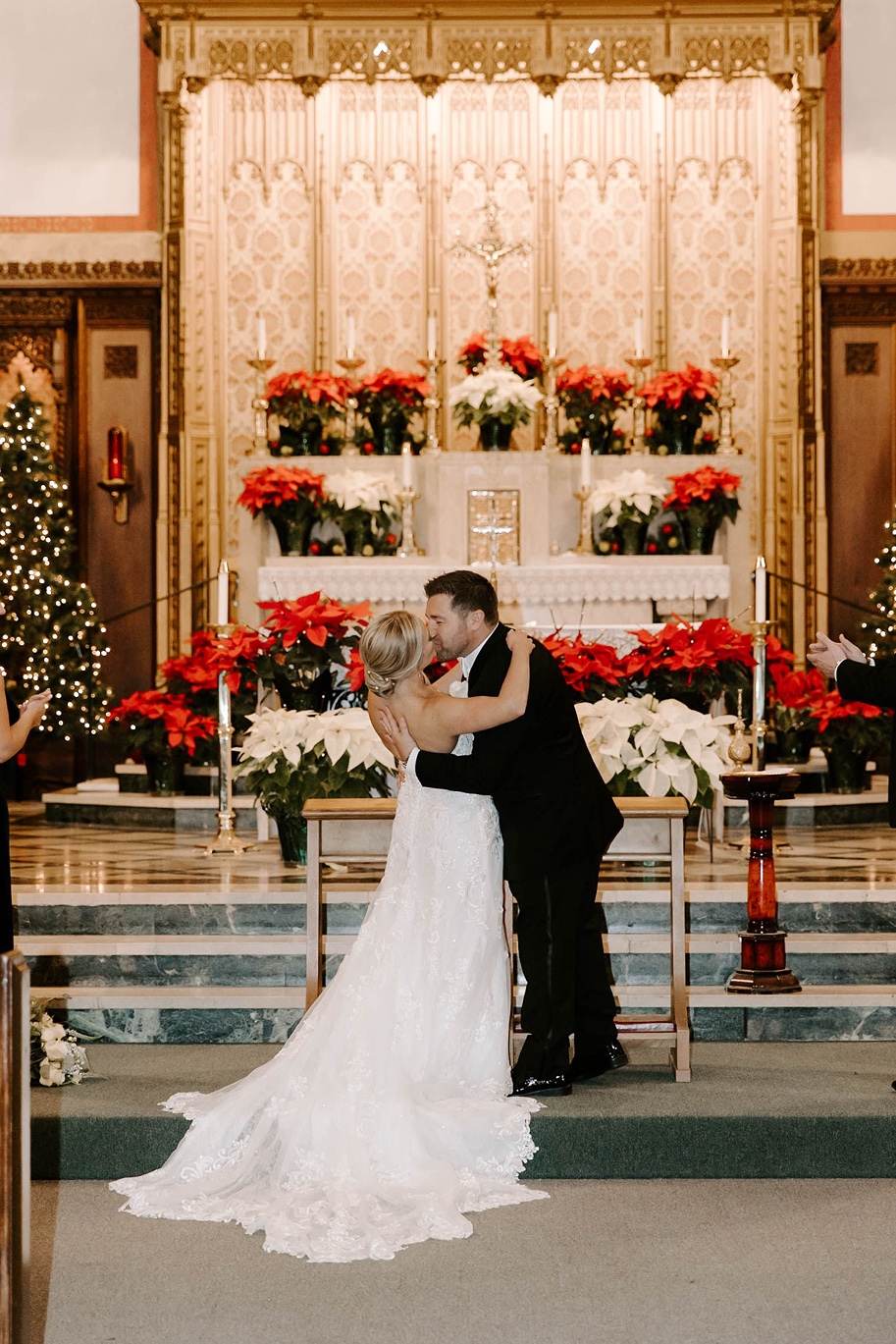 Bride and groom kiss at their winter wedding in Boston