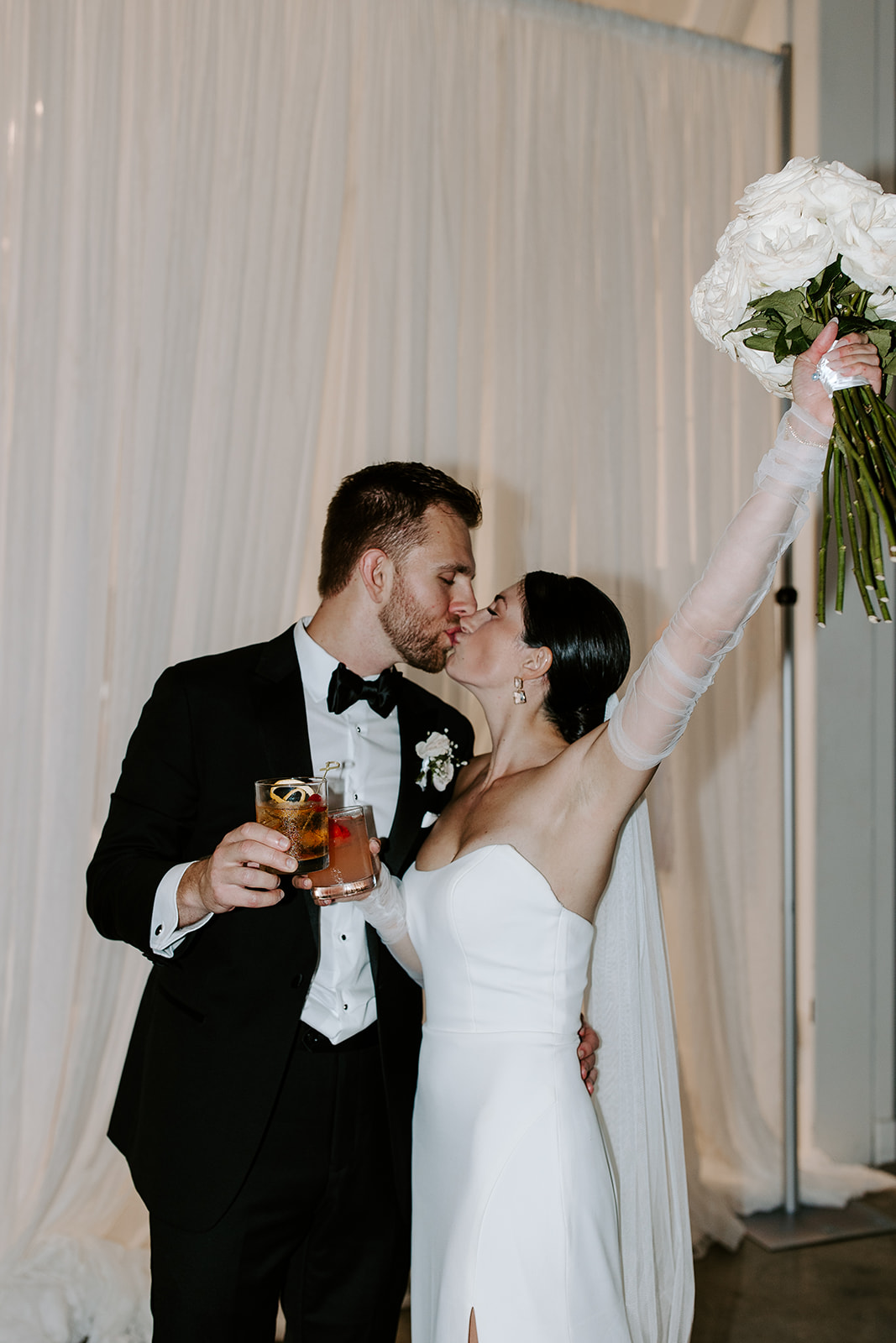 Stunning bride and groom share a kiss on their Boston wedding day!