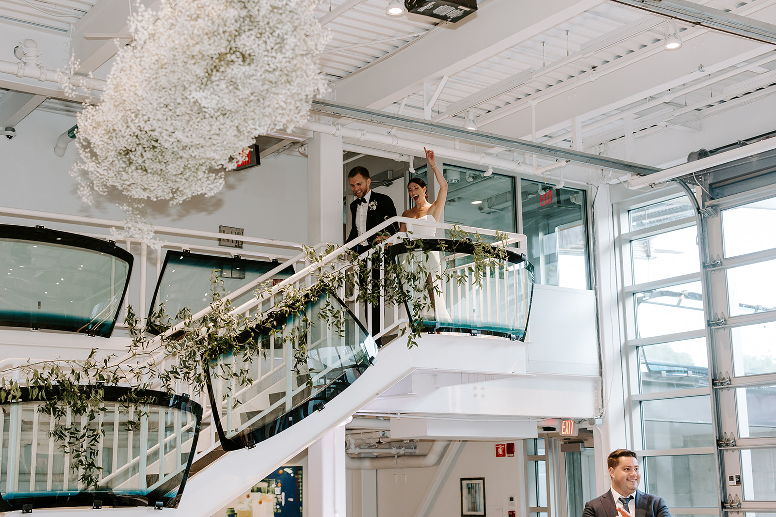 Stunning bride and groom enter their New England wedding ceremony