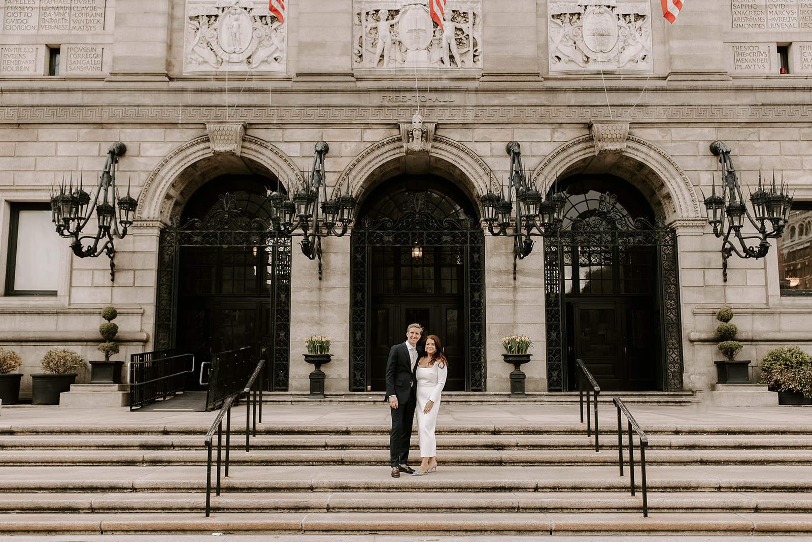 Stunning bride and groom pose together after their dreamy Boston public library wedding