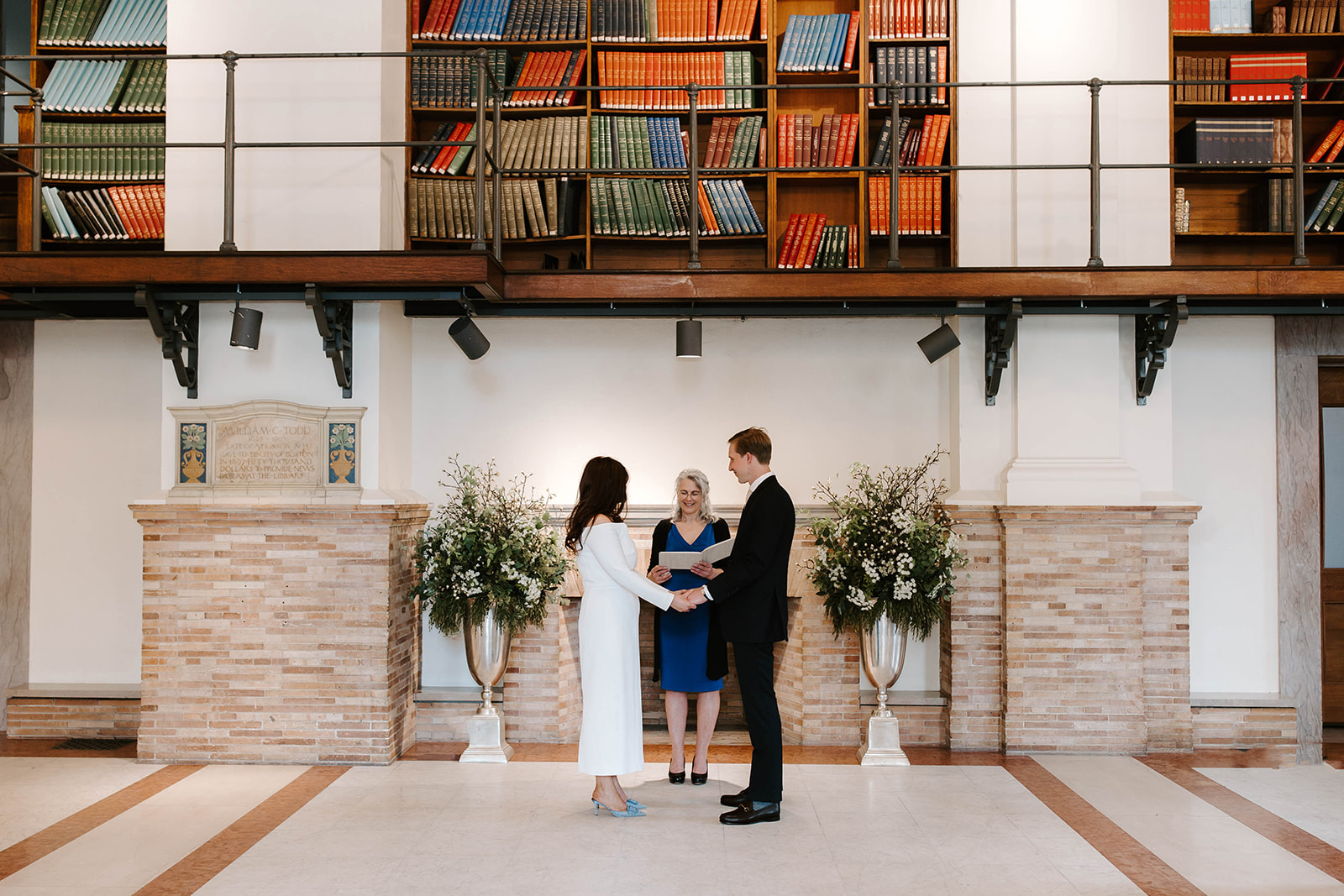 Stunning bride and groom pose together after their dreamy Boston public library wedding