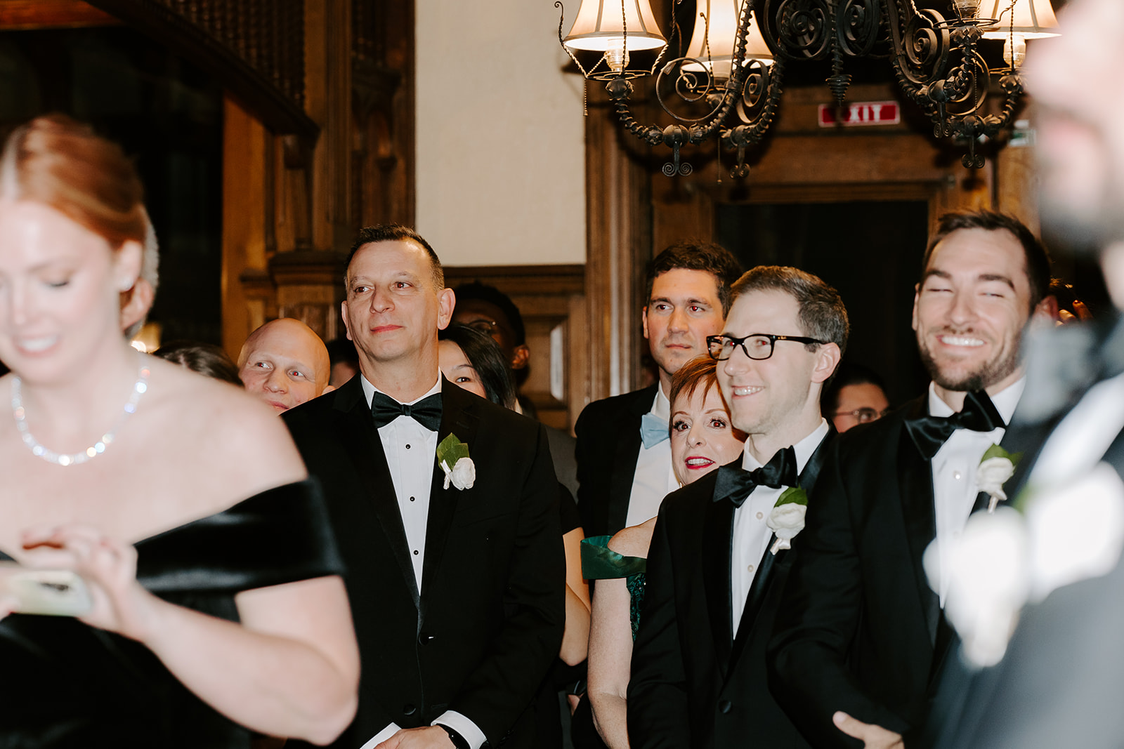 Guests celebrate the bride and groom as they exit their big day