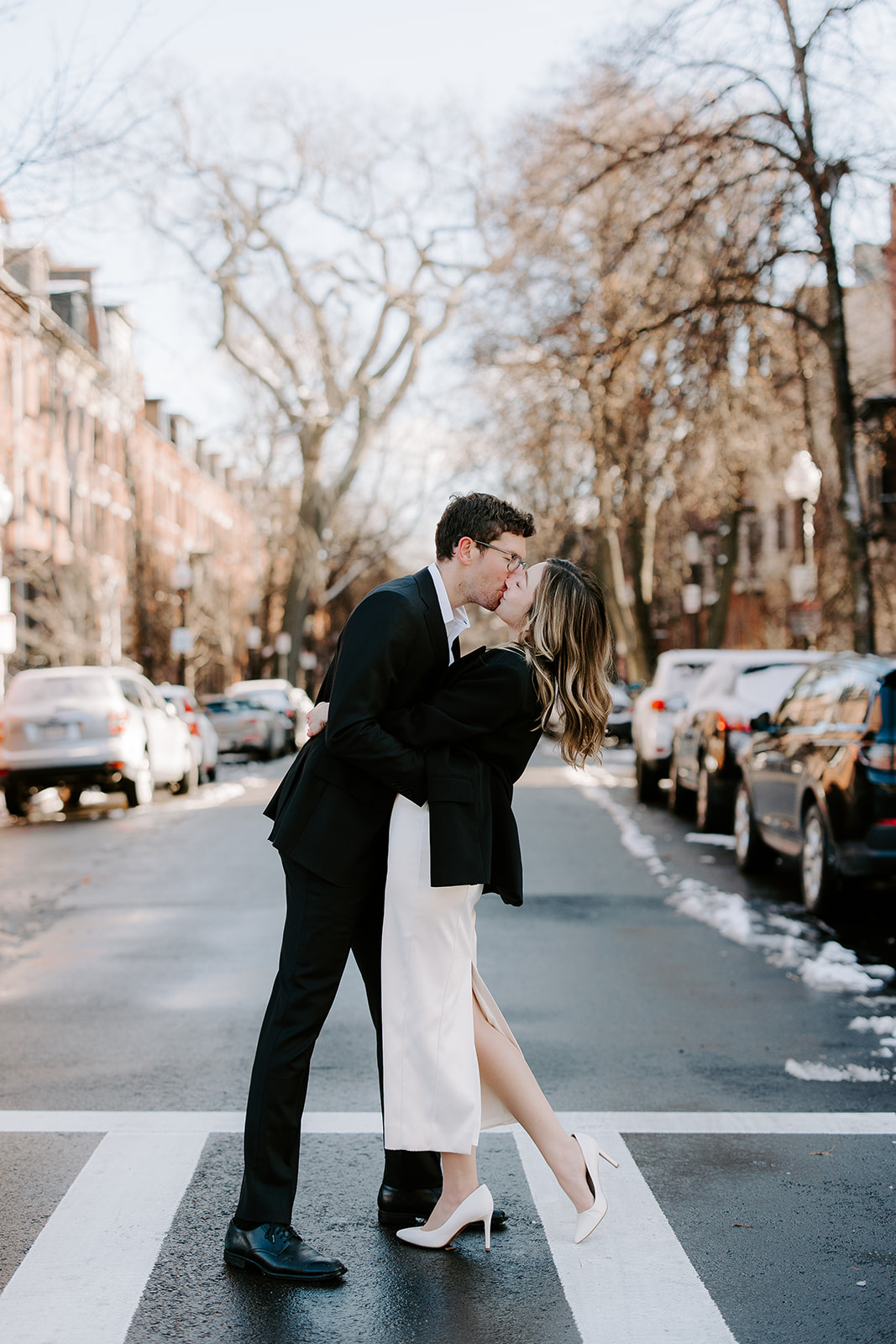 Stunning bride and groom pose together in Boston after their dreamy winter elopement at the Boston Public Library!