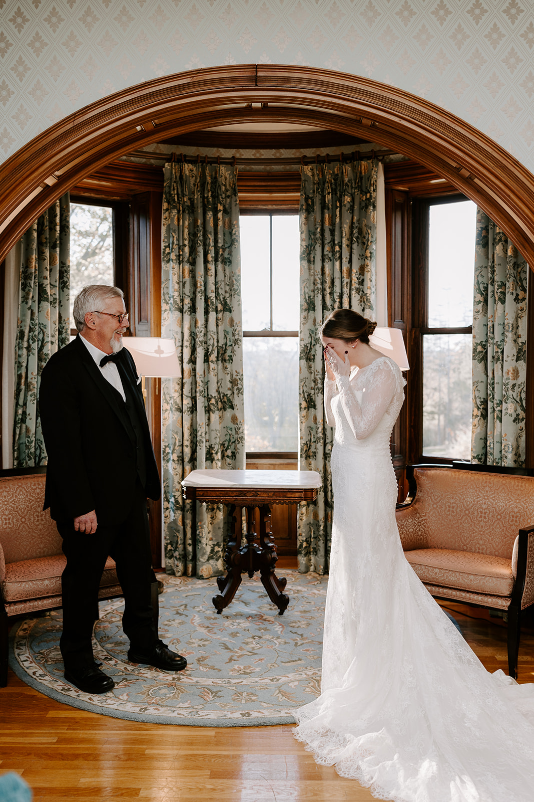 Stunning bride shares a moment with her dad on her wedding day