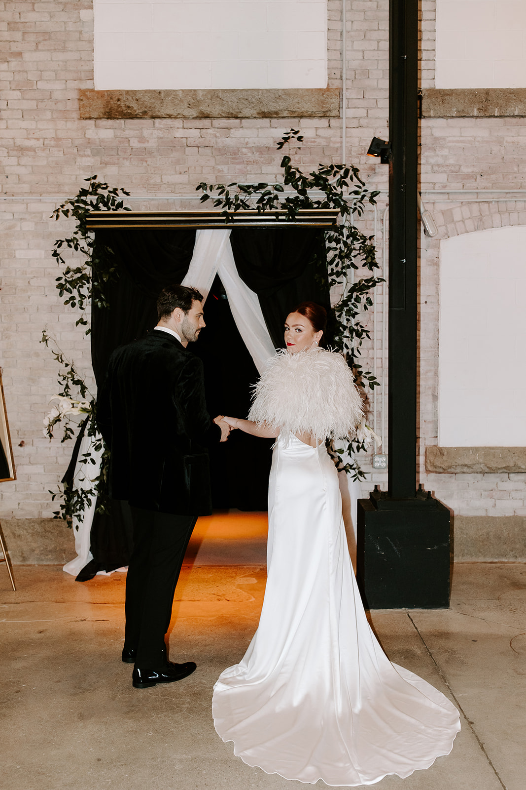 stunning bride and groom pose together after their wedding at the factory wedding venue