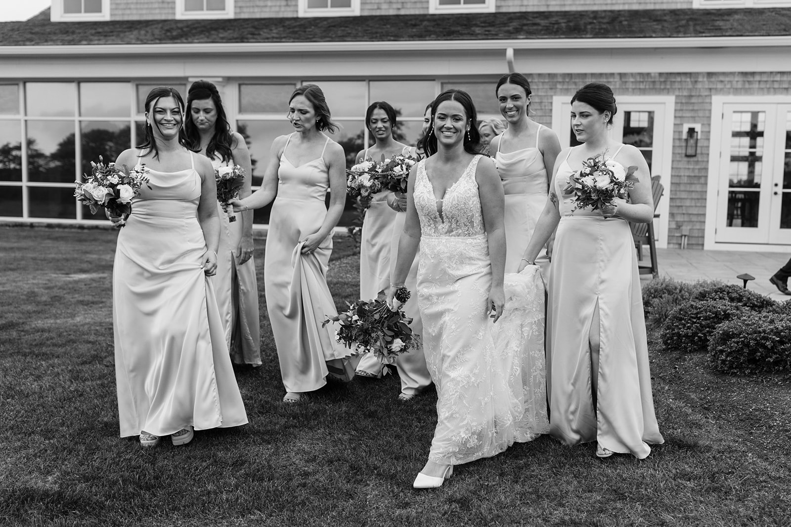 Bridesmaids pose together after the dreamy New England wedding