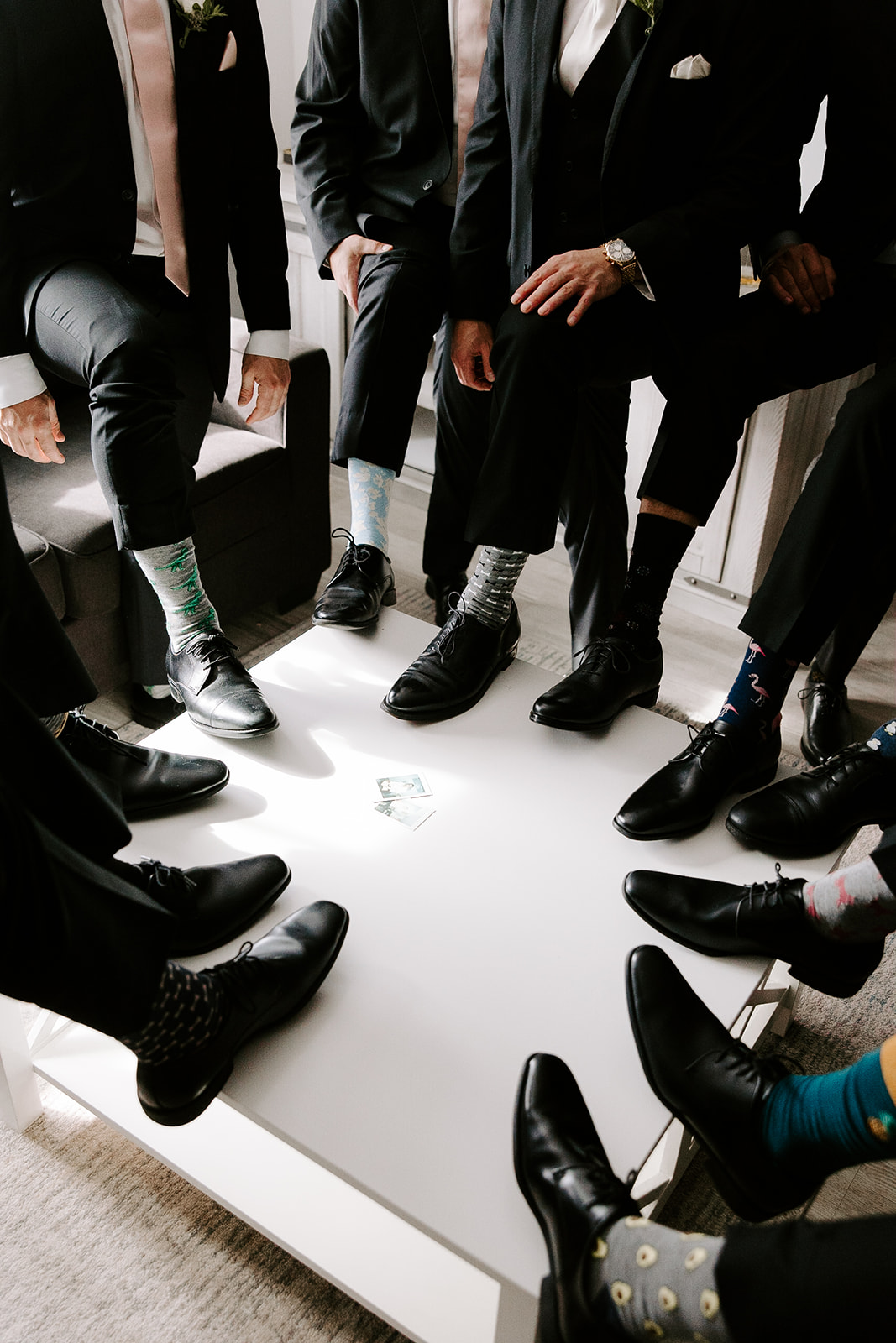 Groomsmen show off their socks prior to the dreamy wedding ceremony
