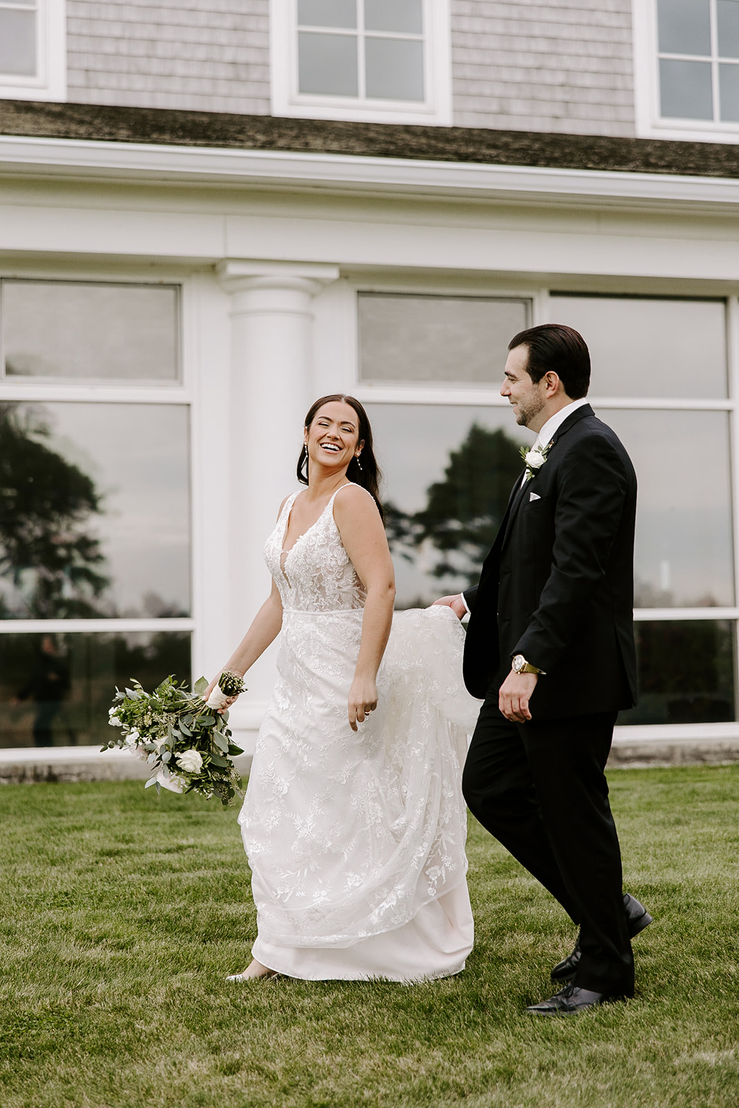 Beautiful bride and groom pose together after their stunning New England wedding day!