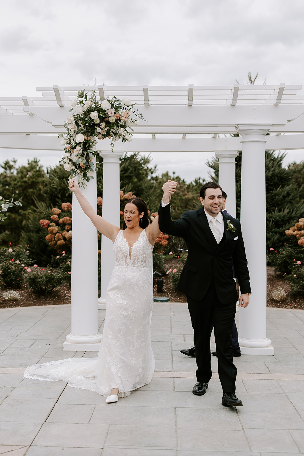 Stunning bride and groom exit their perfect New England