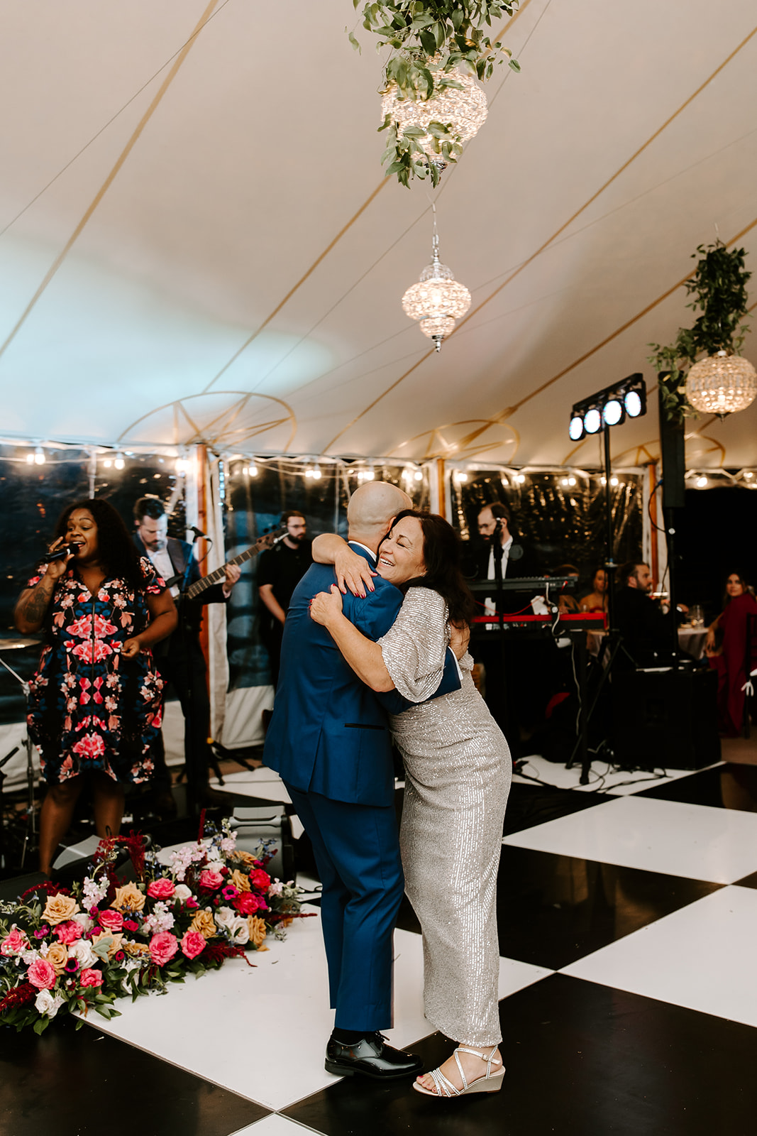 groom and his mom share a dance during his stunning willowdale estate wedding reception