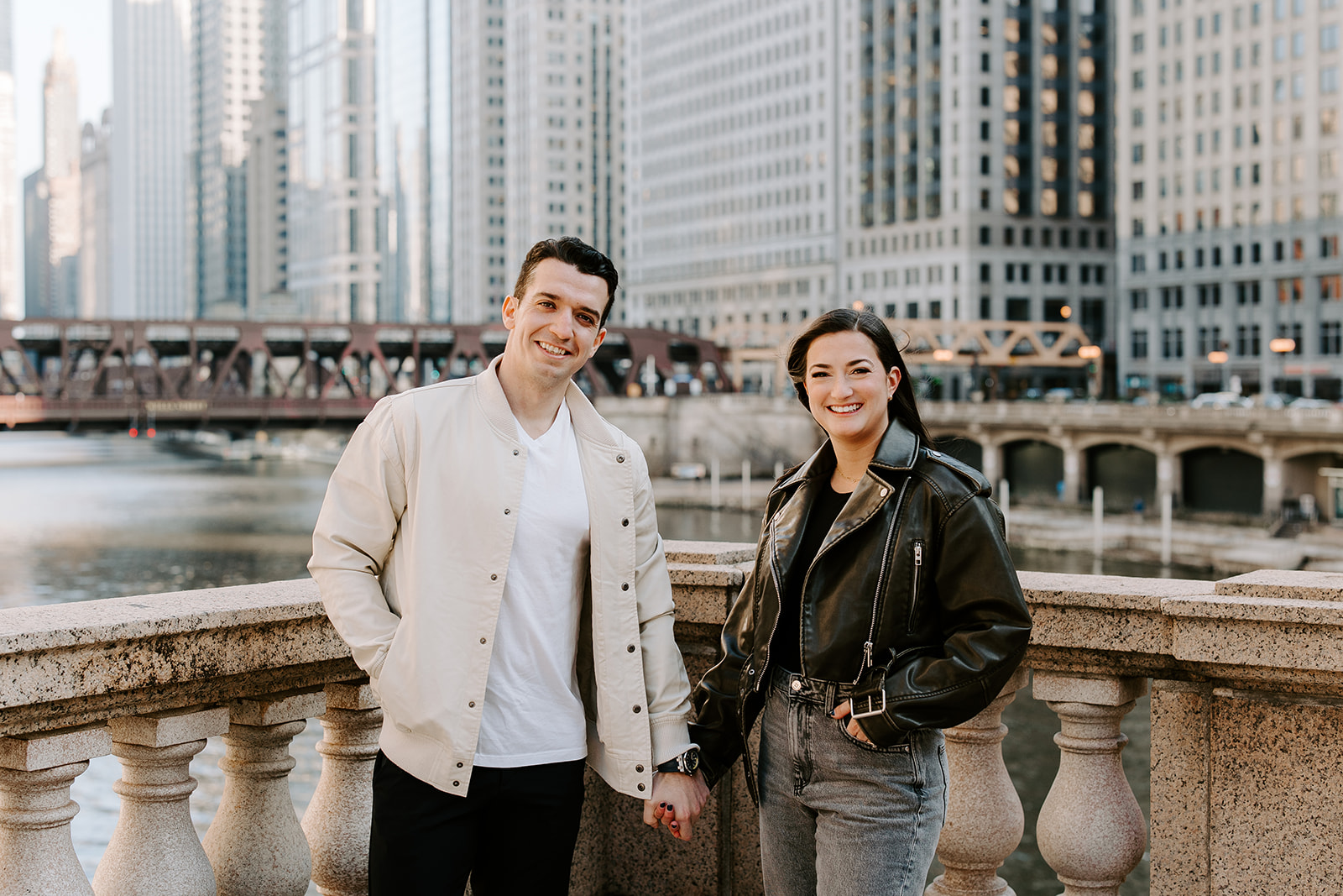stunning couple pose with the skyline during their Chicago engagement photos