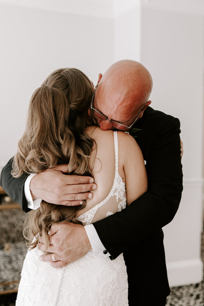 brides emotional first look with dad