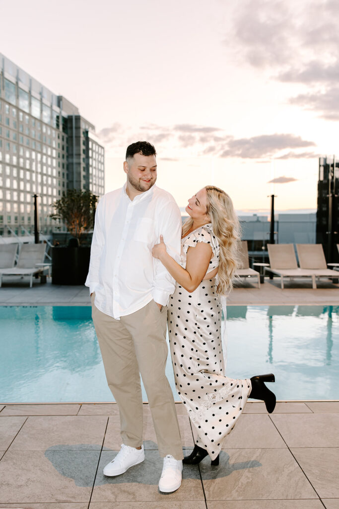 couple posing on roof of omni seaport