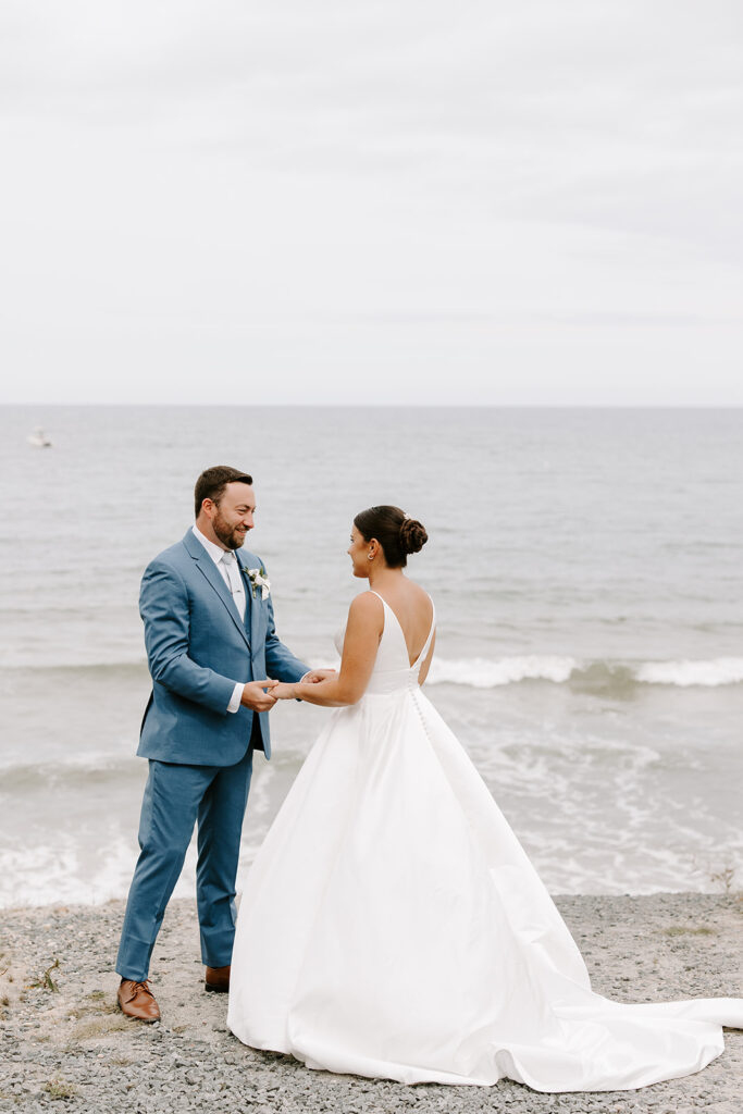 groom during an emotional first look