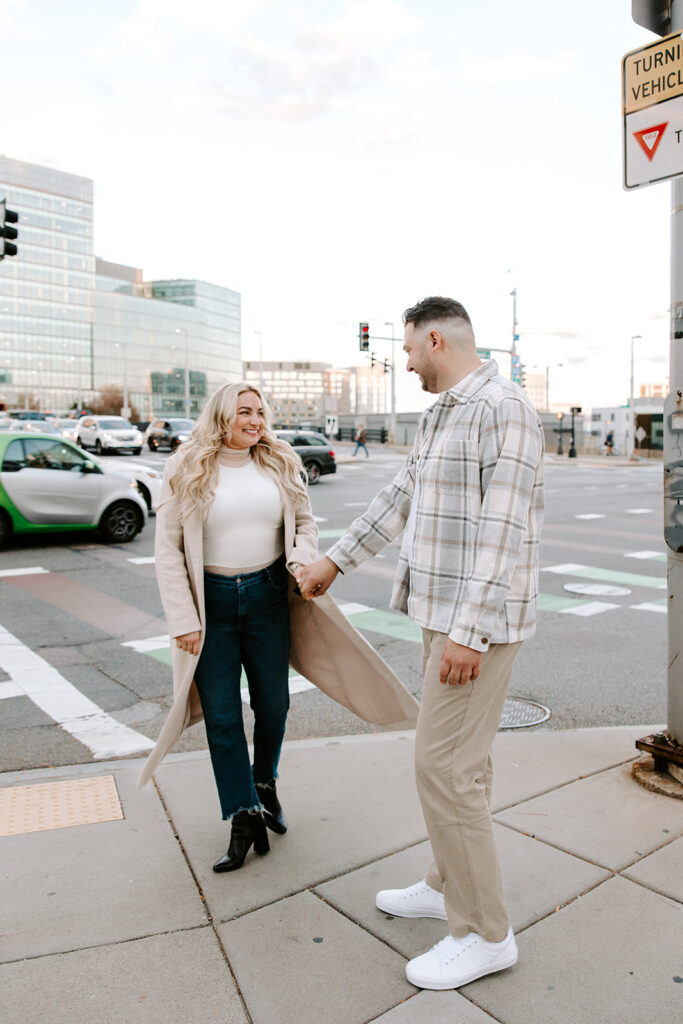 couple walking through downtown boston