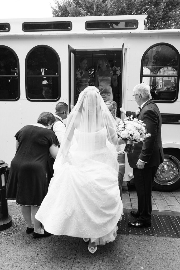 bride leaving trolley to enter ceremony