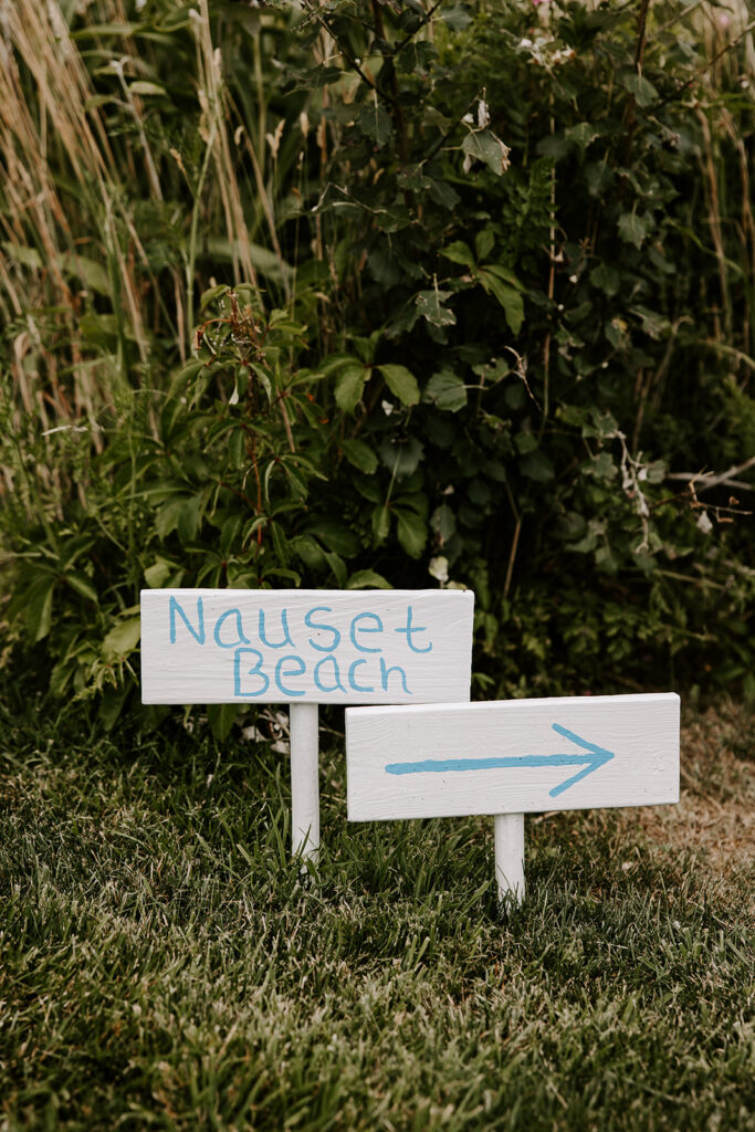 sign directing to beach