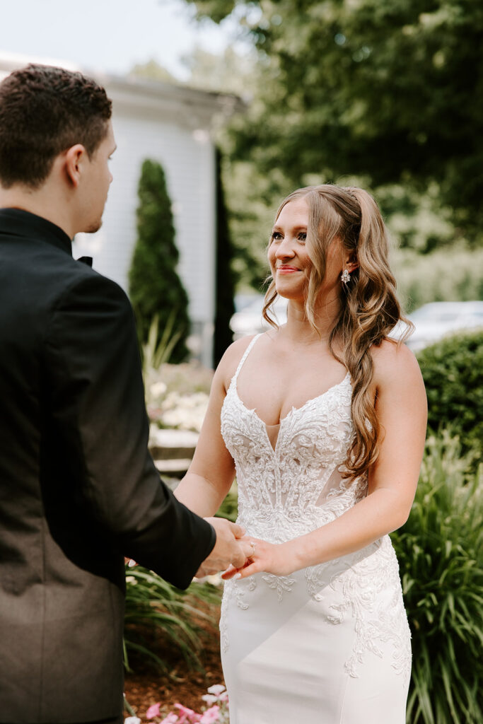 bride looking into grooms eyes