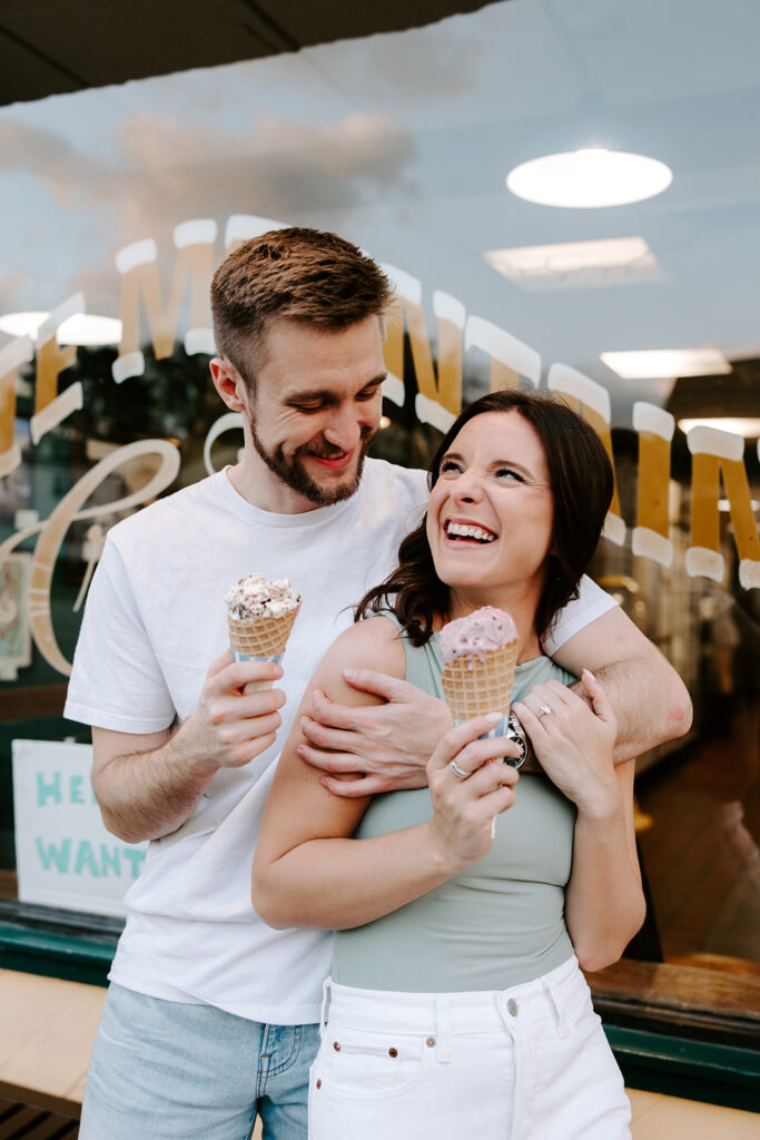 Goofy couple pose during Boston College engagement photos