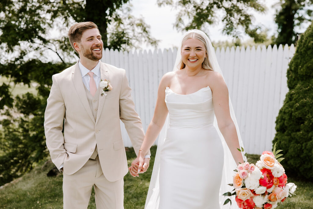 bride and groom smiling