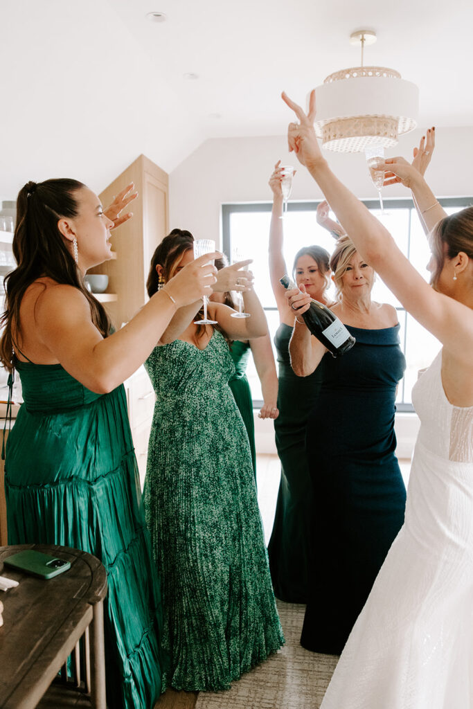 bride celebrating with her bridesmaids