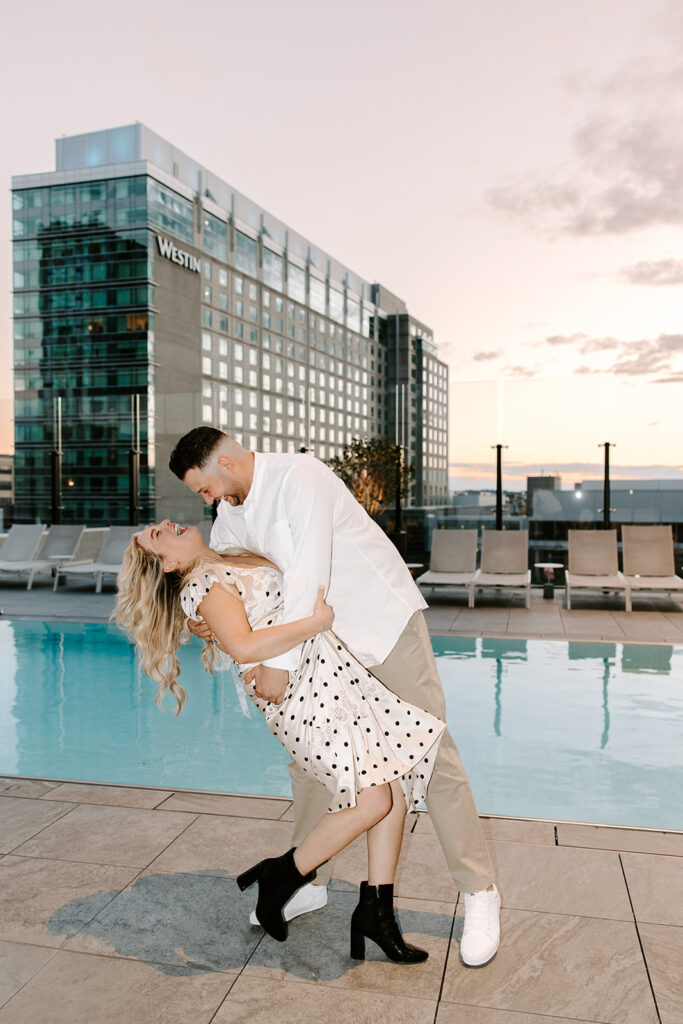 groom dipping bride at omni hoteal seaport