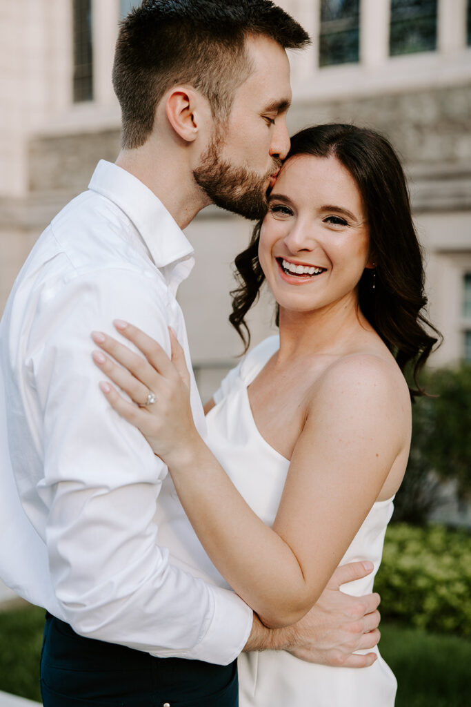 Romantic couple portrait in front of Boston College building