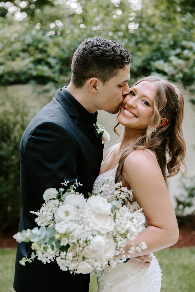 Candid photo of couple laughing during portraits