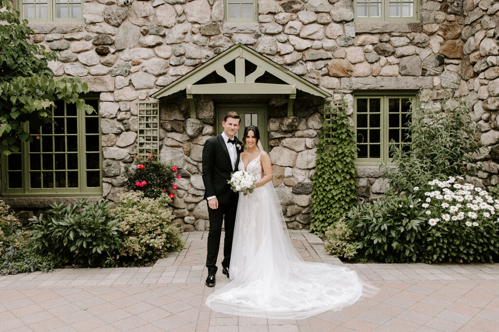 bride and groom in willowdale estate courtyard