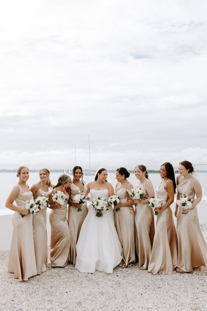 Bridesmaids laughing with bouquets by Michelle Jeanne Floral Design