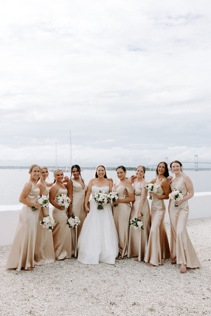Bridesmaids laughing with bouquets by Michelle Jeanne Floral Design