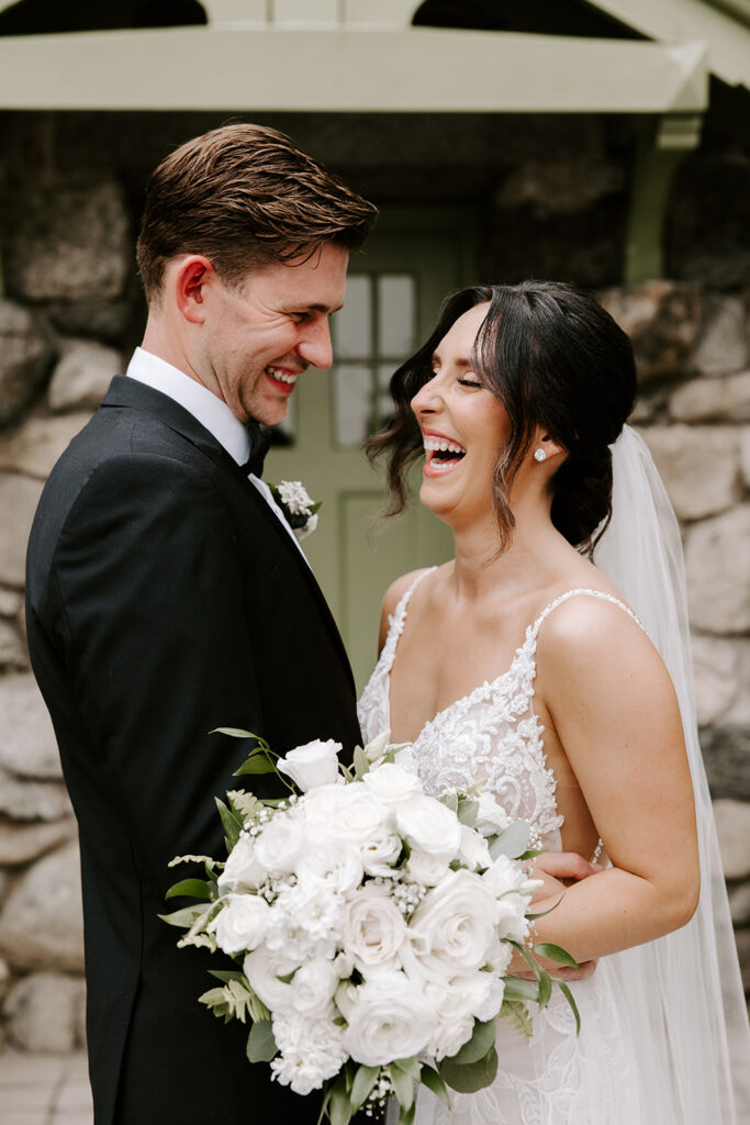 bride and groom laughing