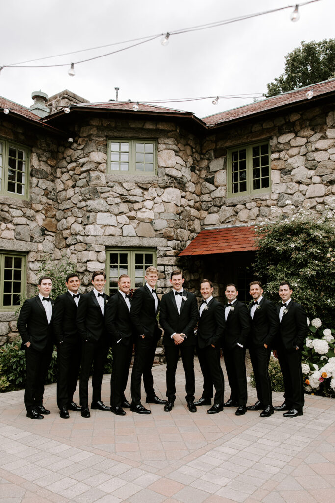 groomsmen in courtyard